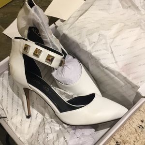 Never worn, white also heels!